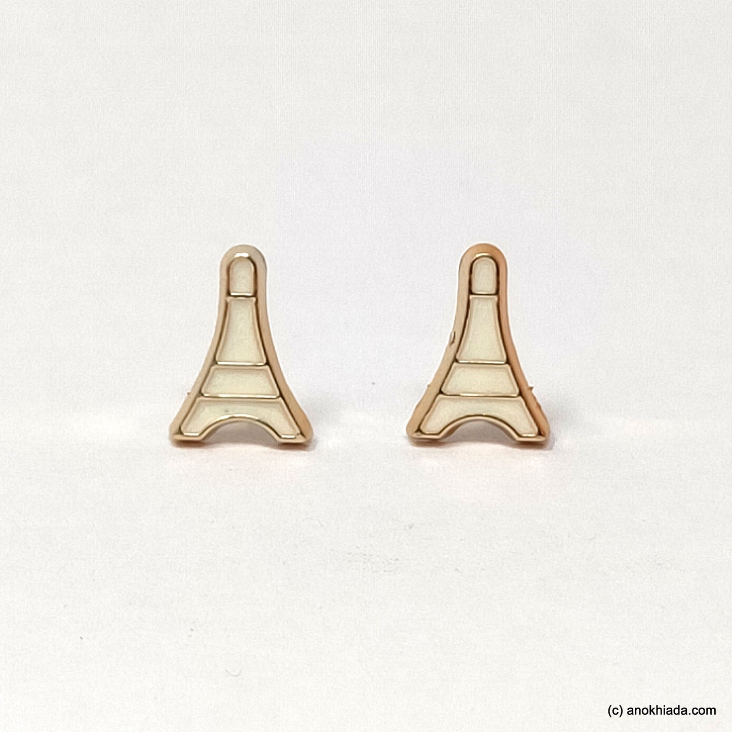 Anokhi Ada White Eiffel Tower Shaped Small Plastic Stud Earrings for Girls ( AR-18u)
