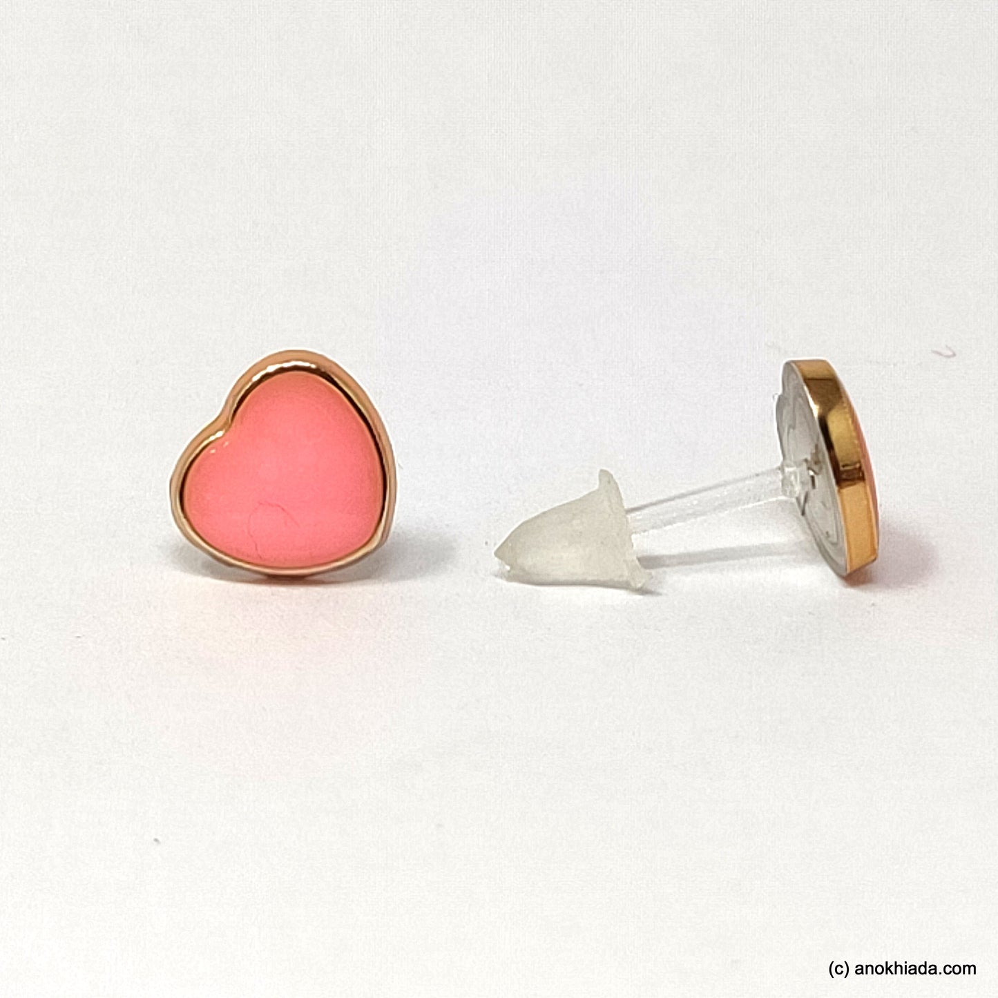 Anokhi Ada Pink Heart Shaped Small Plastic Stud Earrings for Girls ( AR-19e)