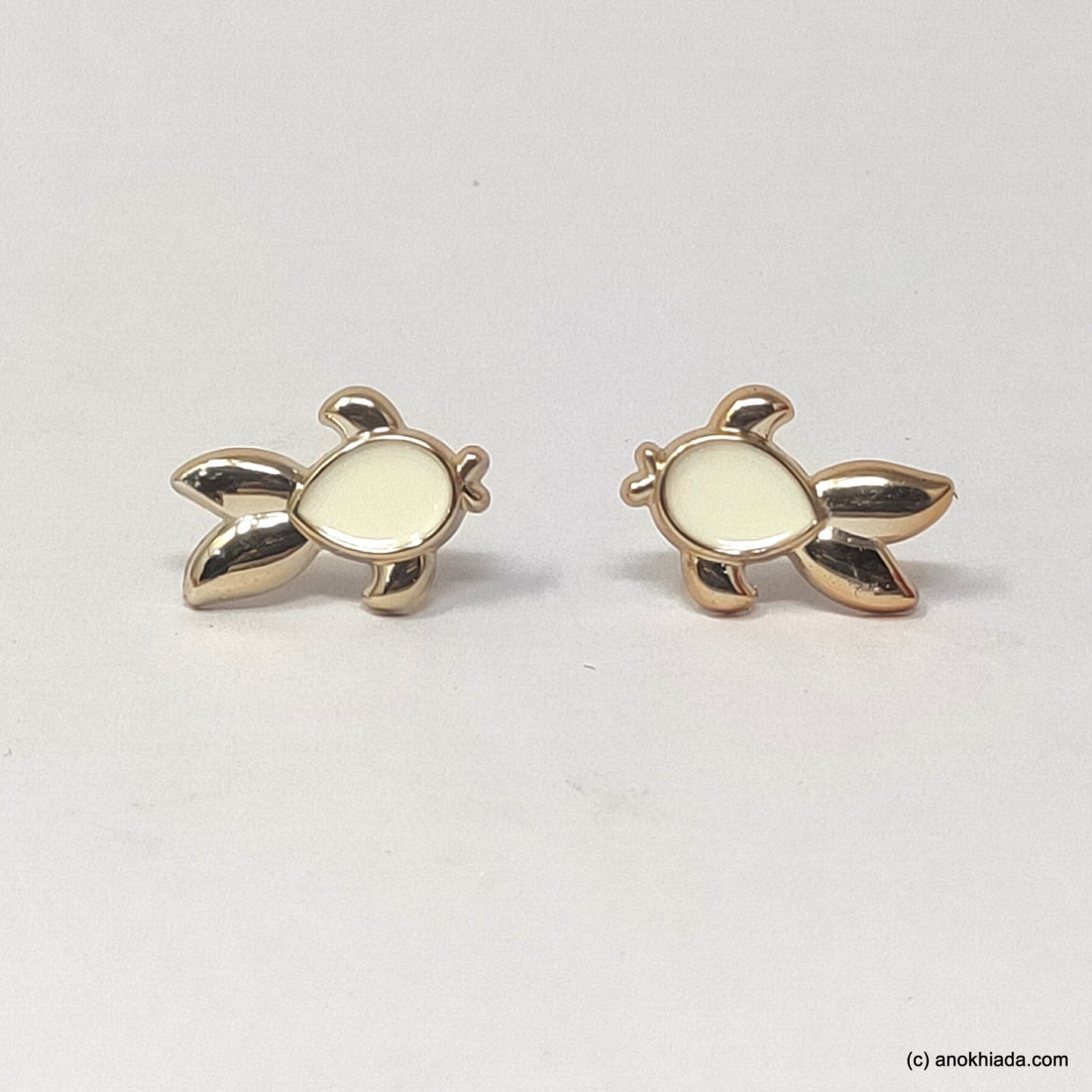 Anokhi Ada White Small Turtle Plastic Stud Earrings for Girls (AR-22q)