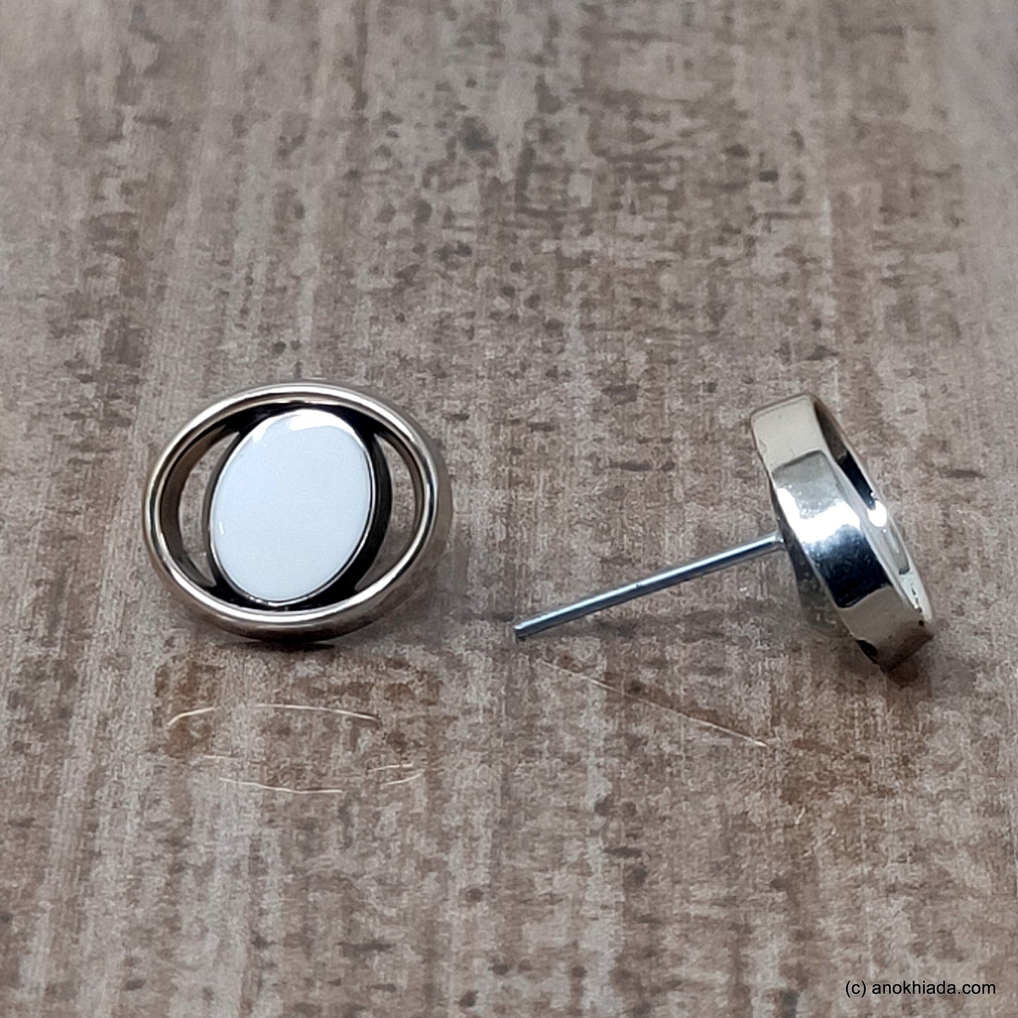 Anokhi Ada Small Oval Plastic Stud Earrings for Girls ( White, AR-26f )