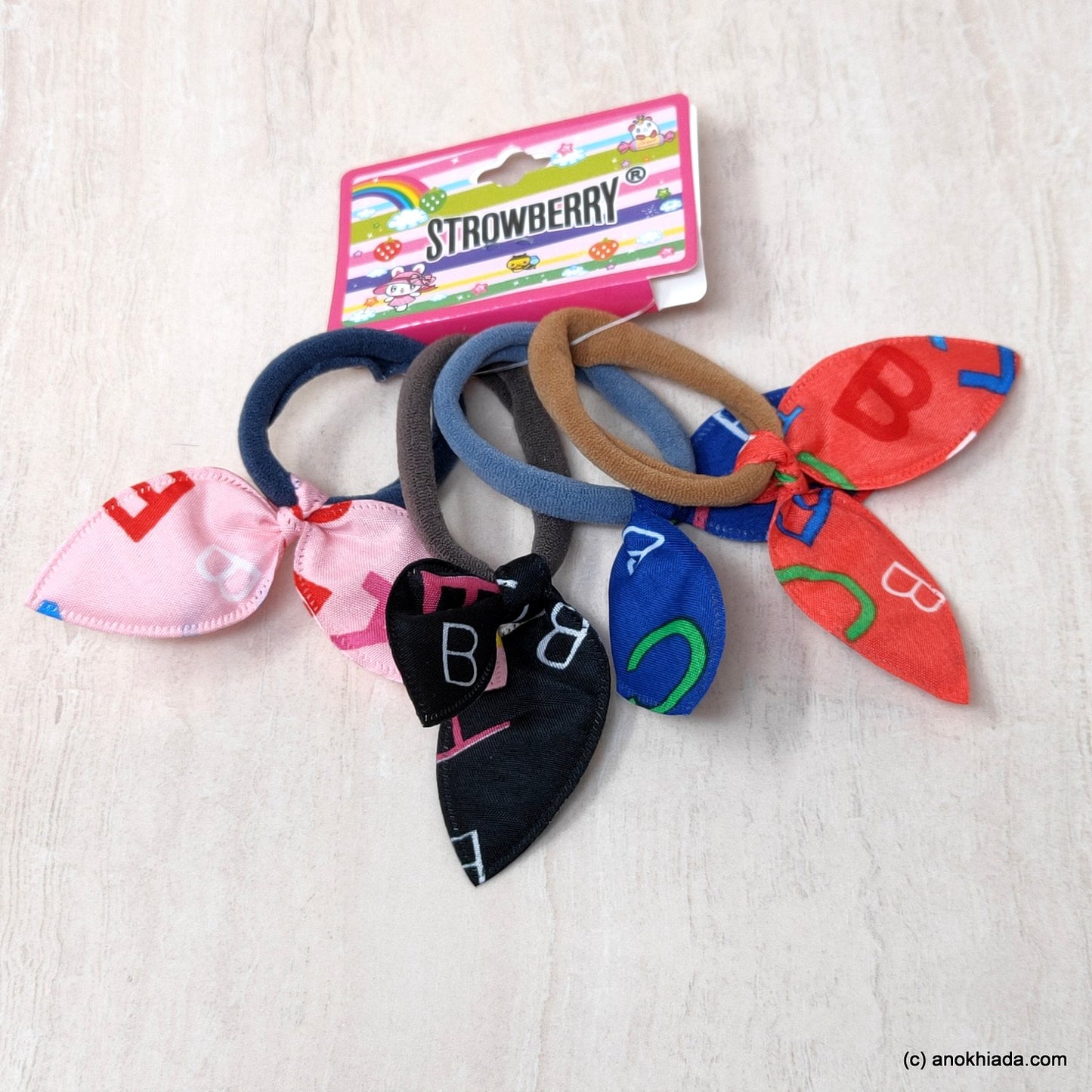 Anokhi Ada Alphabets Print Hair Ties/ Hairbands for Girls and Women (ZG-41a Ponytail Holders, 4 Pcs Assorted Colour Rubber)