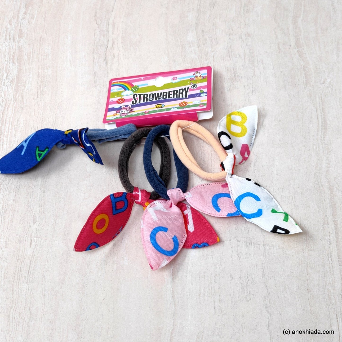 Anokhi Ada Alphabets Print Hair Ties/ Hairbands for Girls and Women (ZG-41a Ponytail Holders, 4 Pcs Assorted Colour Rubber)