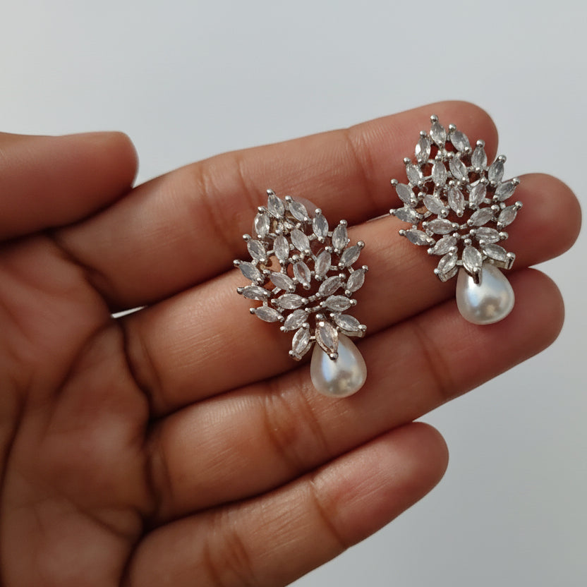 Anokhi Ada Silver Stone and Pearl Drop AD Stud Earrings for Girls & Women | American Diamond Party Wear Earrings | Elegant Daily Wear Jewelry