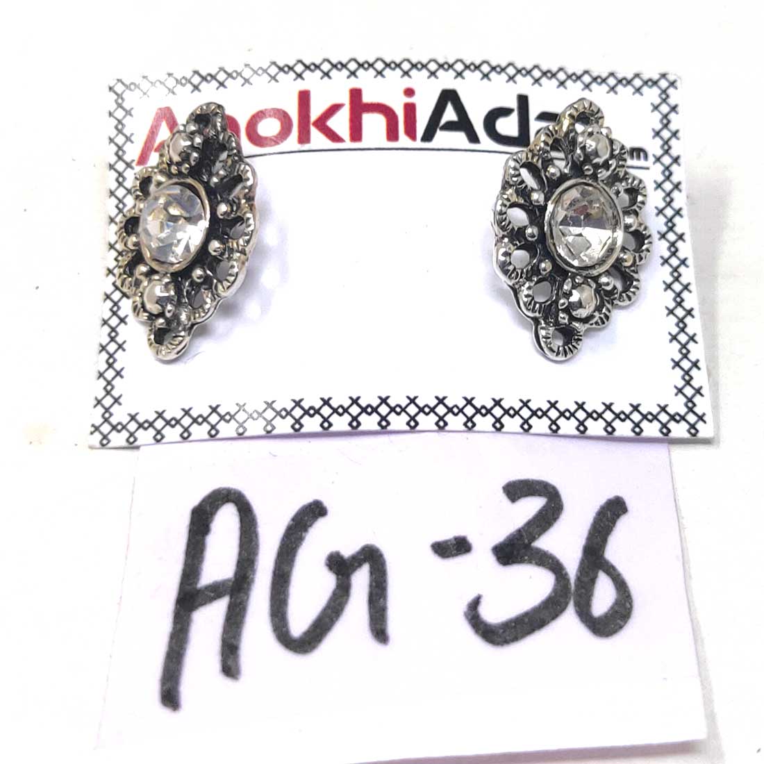 Anokhi Ada Metal Stud Earrings for Girls and Women  (Silver)-AG-36