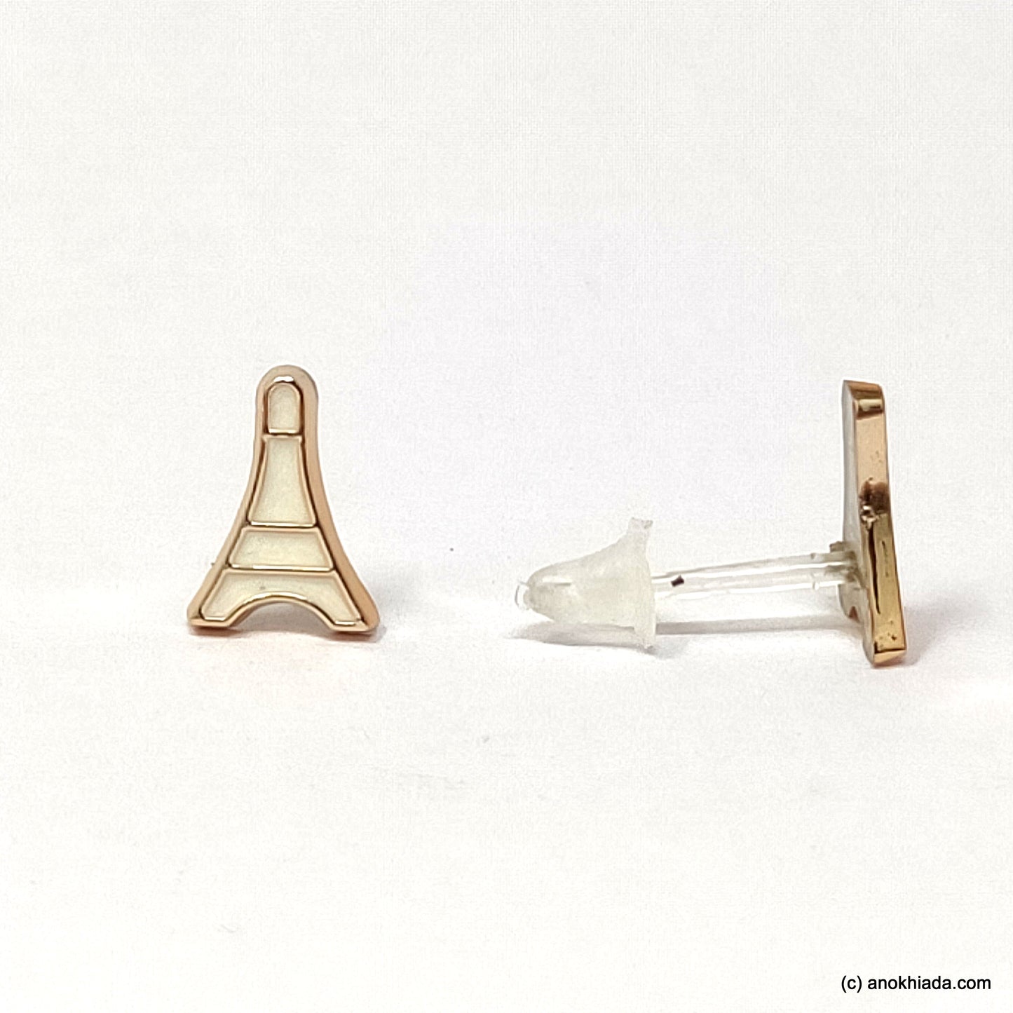 Anokhi Ada White Eiffel Tower Shaped Small Plastic Stud Earrings for Girls ( AR-18u)