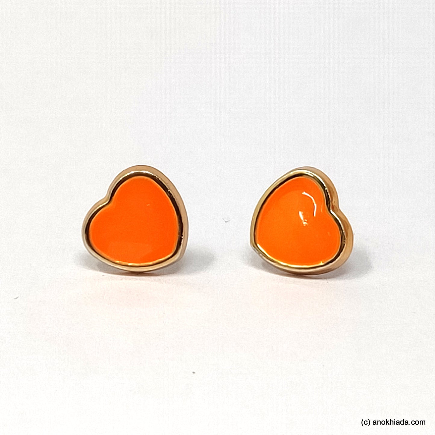Anokhi Ada Orange Heart Shaped Small Plastic Stud Earrings for Girls ( AR-19c)
