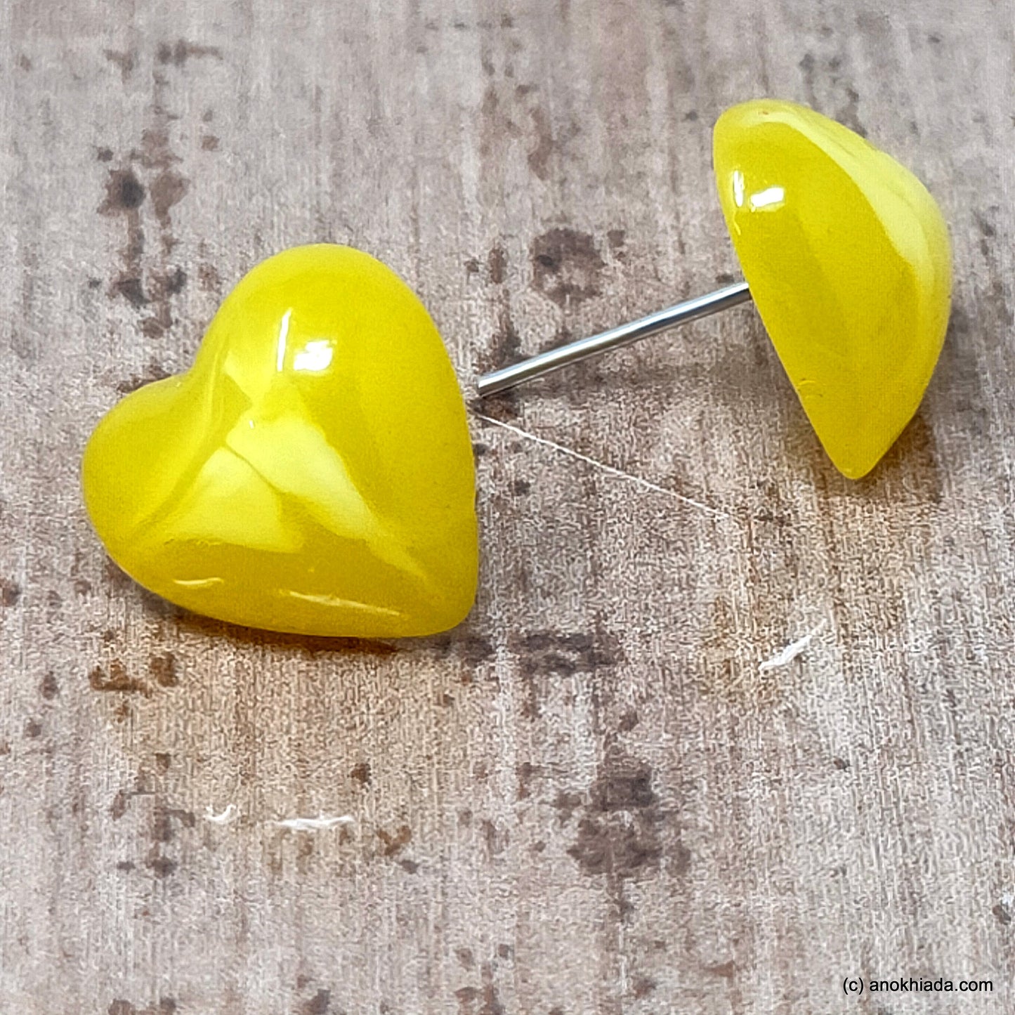 Anokhi Ada Small Heart Shaped Plastic Stud Earrings for Girls ( Yellow, AR-29b )